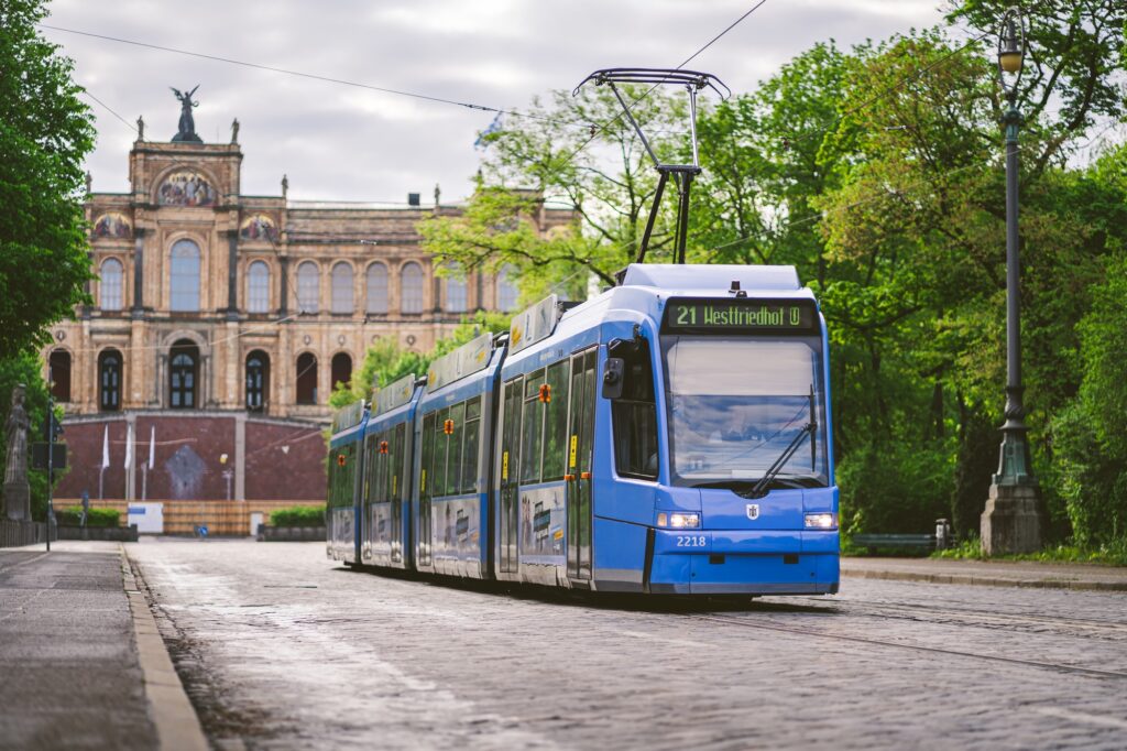 Munich's blue tram in front of Maximilianeum, Bavaria's state captial building - a great way to start you 5 days in Munich 